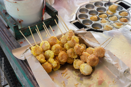 Selective focus Cilor Tusuk or Pentol Telur Gulung is a typical Indonesian snack. Usually Sell as Satay at Street Food. photo