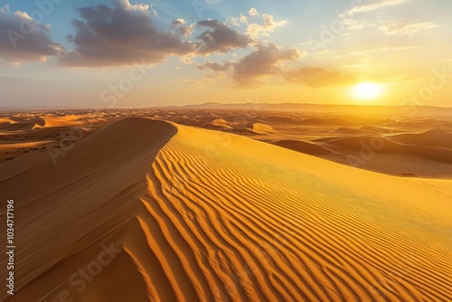 A vast desert landscape with sweeping sand dunes and intricate wind patterns etched into the surface.  photo