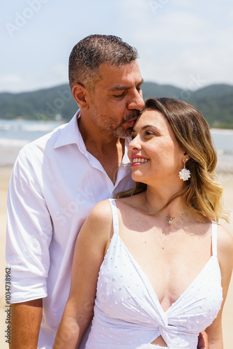 man and woman, couple, dressed in white, celebrating together, new year