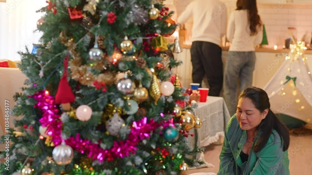 multi generation asian family grandfather and grandmom with nephew child boy prepare christmas eve thanksgiving party together decorate setting living room with christmas tree while spending time multi generation asian family grandfather and grandmom with nephew child boy prepare christmas eve thanksgiving party together decorate setting living room with christmas tree while spending time