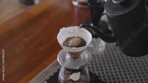 Dripping coffee on a paper filter