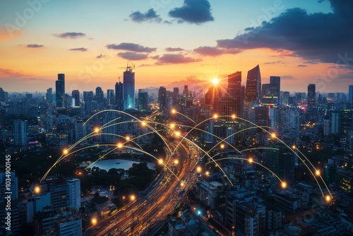 A panoramic cityscape with a glowing network of lines connecting buildings, showcasing a modern metropolis at sunset. photo