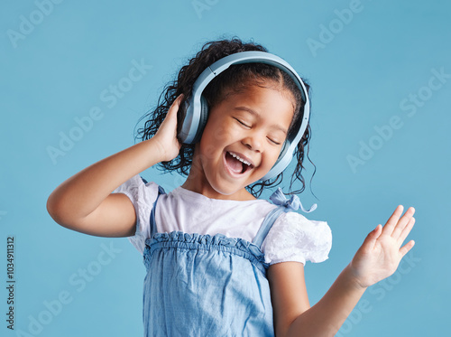Canvastavla Studio, kid and singing with headphones for dancing, hearing and happy with sound for audio track