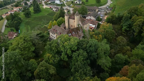 Reveal drone shot behind Vaumarcus Castle in Canton of Neuchatel Switzerland photo