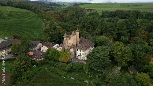 Establishing drone shot of Vaumarcus Castle in Canton of Neuchatel Switzerland photo