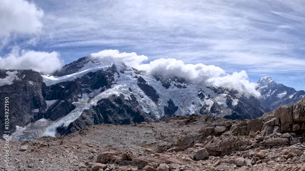 Snow-Capped Peaks and Glacial Valley of Mount Sefton, Southern Alps, New Zealand – Rugged Mountain Terrain and Alpine Scenery Snow-Capped Peaks and Glacial Valley of Mount Sefton, Southern Alps, New Zealand – Rugged Mountain Terrain and Alpine Scenery