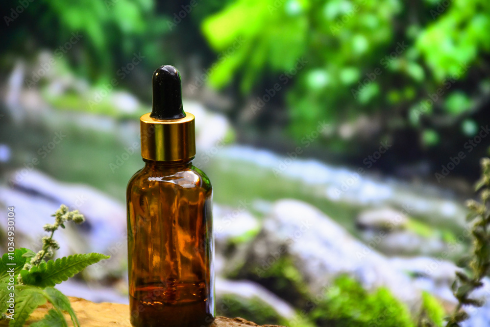 aromatherapy bottle with oil for homeopathic medicine or herbal medicine. Massage Oils. Natural cosmetics, skin care product in brown glass bottle on wood. Bottle with floral essential oil, close up aromatherapy bottle with oil for homeopathic medicine or herbal medicine. Massage Oils. Natural cosmetics, skin care product in brown glass bottle on wood. Bottle with floral essential oil, close up