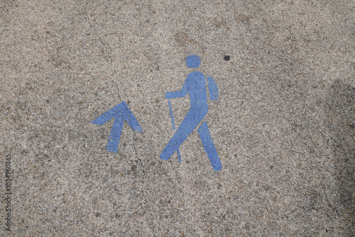 Nordic walking track sign pedestrian painted on the street photo