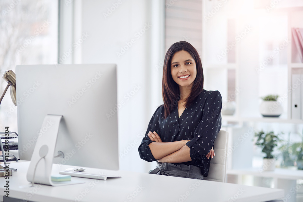 Arms crossed, computer and portrait of businesswoman at desk in office for administration career. Report, research and smile with happy employee in professional workplace for agency development Arms crossed, computer and portrait of businesswoman at desk in office for administration career. Report, research and smile with happy employee in professional workplace for agency development