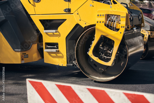 Public city street reconstrunction with heavy machines. photo