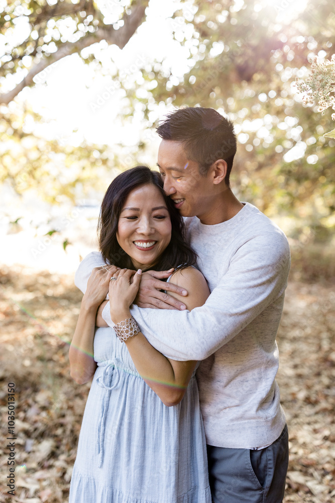 Couple Embracing on Sunny Day in Park in San Diego Couple Embracing on Sunny Day in Park in San Diego