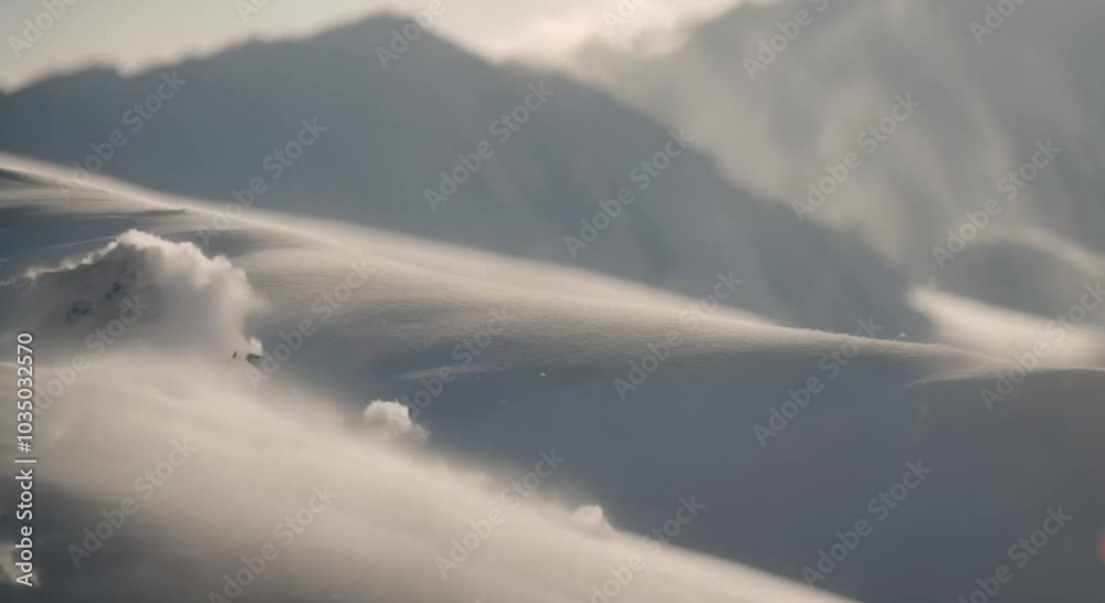 Slow-Motion Snow Drift on a Windswept Mountain Ridge Slow-Motion Snow Drift on a Windswept Mountain Ridge