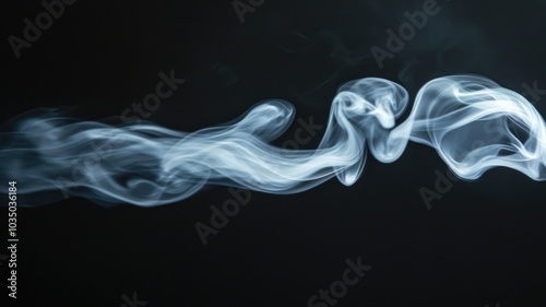 Wisps of white smoke swirling in front black background