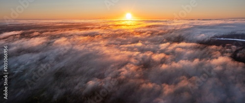 God. Sabbath. Autumnal equinox. Autumn Morning Sea fog in the rose light is very beautiful and fabulous, picturesque vague wave rolled on the slopes of the peaks