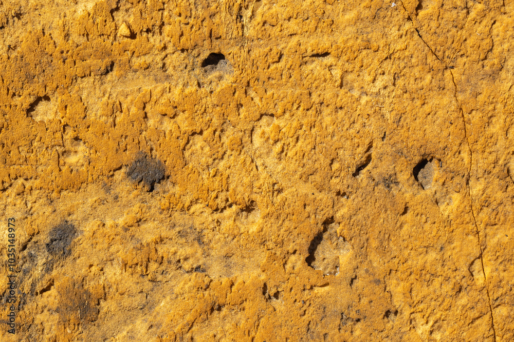 Construction worker mineral wool thermally insulating house attic with glass wool