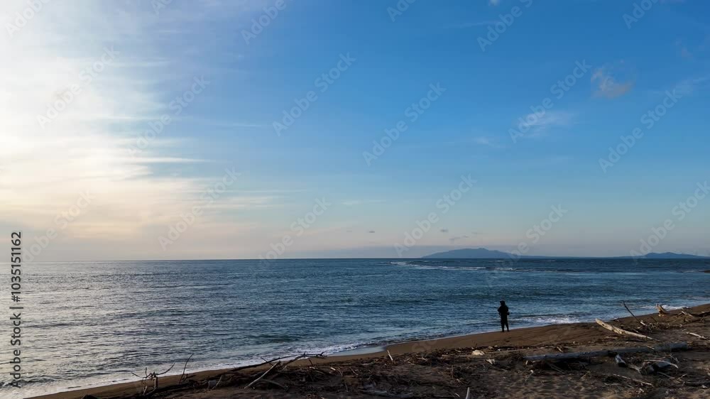 海 釣り人 砂浜 海岸 シルエット イメージ 海 釣り人 砂浜 海岸 シルエット イメージ