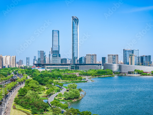 Fototapeta Naklejka Na Ścianę i Meble -  Roads with buildings and natural scenery in modern city in Suzhou, China