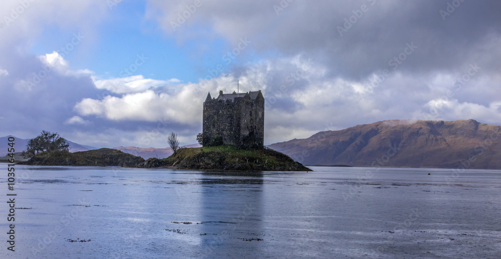 Picturesque Castle Stalker on an island on Loch Linnhe, Scotland Picturesque Castle Stalker on an island on Loch Linnhe, Scotland
