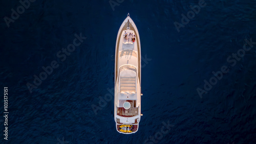 Aerial view of a luxurious yacht sailing on the serene blue ocean, Baja California Sur, Mexico.