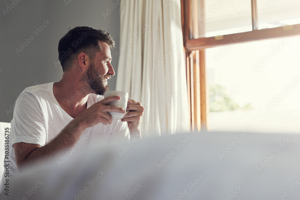 Fototapeta premium Coffee, tea and bedroom thinking with man, smile and drinking warm beverage in home bed for weekend. Morning, relax or espresso with young guy, rest or wake up for routine in house or apartment