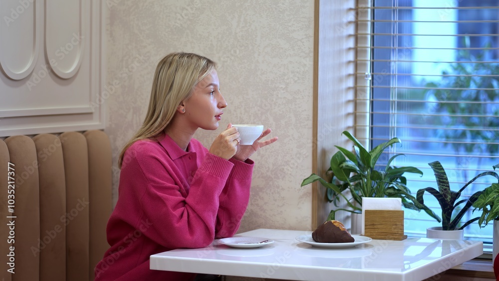 A woman enjoying a peaceful coffee moment in a stylish caf setting A woman enjoying a peaceful coffee moment in a stylish caf setting