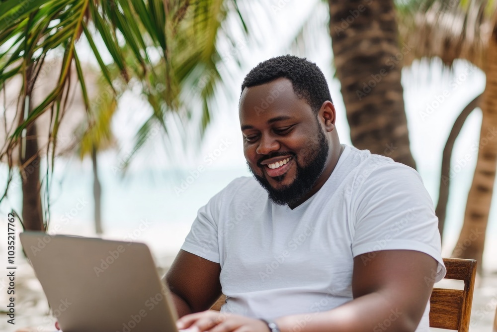 A person typing away on their laptop in a quiet setting A person typing away on their laptop in a quiet setting