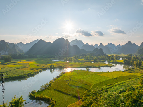 Fototapeta Naklejka Na Ścianę i Meble -  Aerial landscape in Phong Nam valley, Cao bang province, Vietnam with river, nature, rice fields, beautiful destination in Northern Vietnam