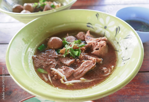 fresh Thai tender beef noodles on table