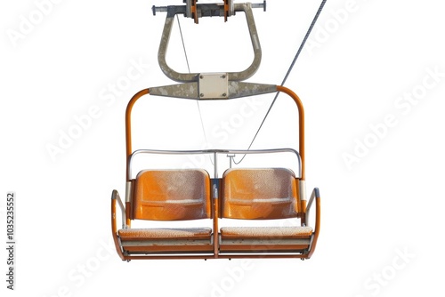 A pair of chairlift seats sitting at the top of a mountain lift, ready for use