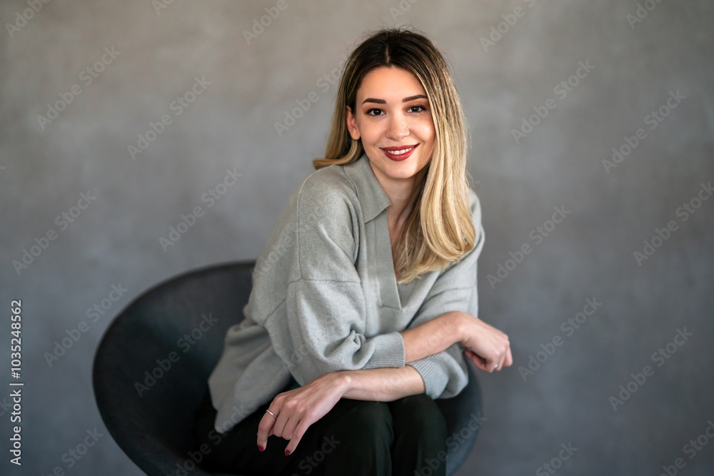 Portrait of a female designer, business woman in the office. Successful woman freelancer, business Portrait of a female designer, business woman in the office. Successful woman freelancer, business