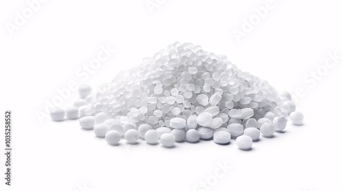 Pile of White Plastic Pellets on White Background photo