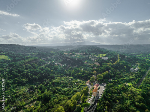 Aerial view of lush and picturesque countryside with trees and hills, Orte, Lazio, Italy. photo