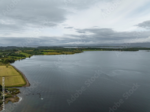 Aerial view of tranquil Loch Creran surrounded by serene greenery and picturesque fields, Oban, United Kingdom. photo