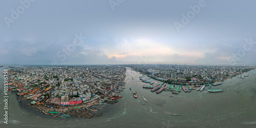 Aerial view of Sadarghat and the Buriganga River with ships in a bustling urban landscape, Keraniganj, Bangladesh. photo