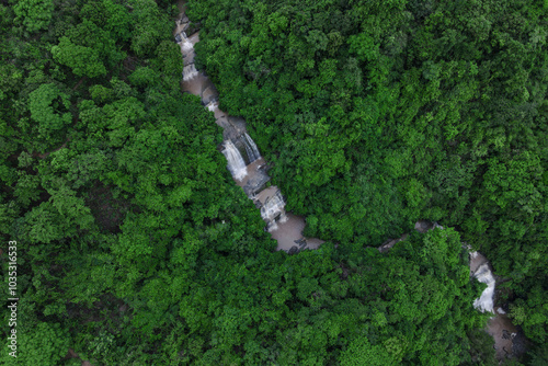 Aerial view of cascading Khaiyachara Waterfalls surrounded by lush green forest, Mirsharai, Bangladesh. photo