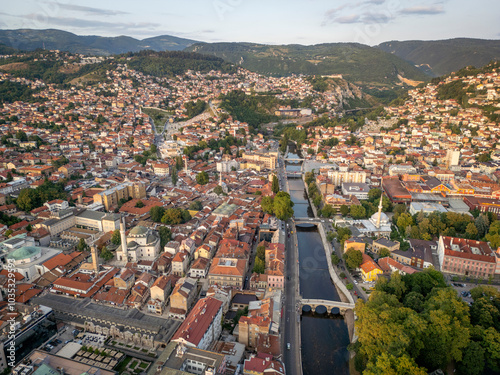 Aerial view of Bascarsija and the Miljacka river with historic architecture and vibrant rooftops, Sarajevo, Bosnia and Herzegovina. photo