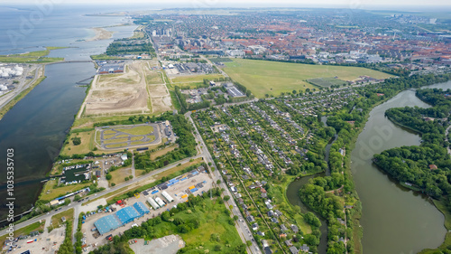 Aerial view of beautiful city complex and skyline with greenery and river, copenhagen, denmark. photo