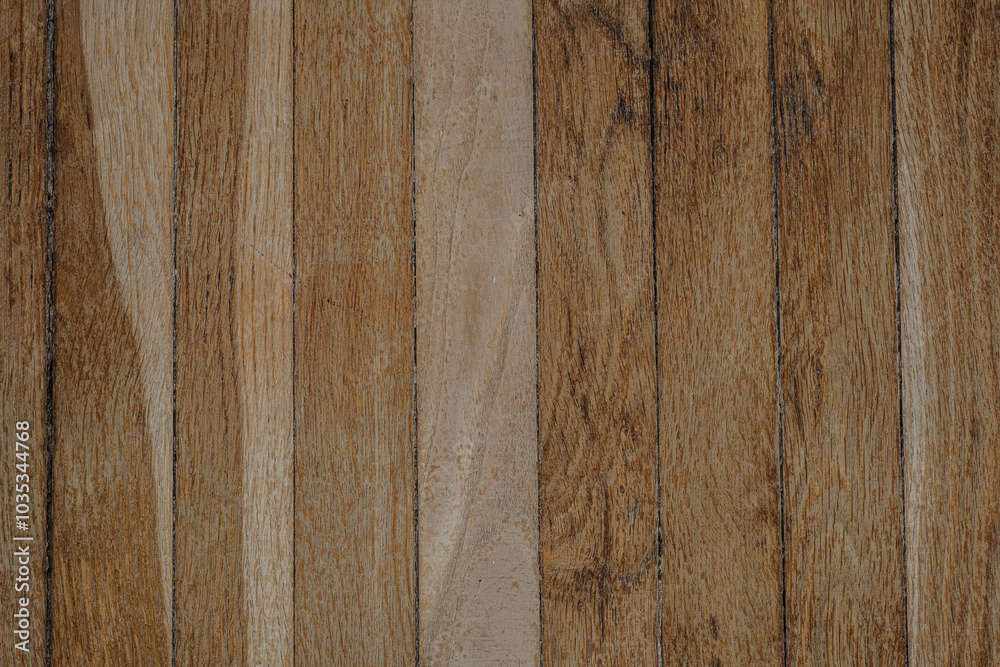 Naklejka premium Wooden planks arranged neatly showing natural grain patterns in warm tones during daylight
