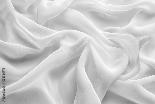 Soft white fabric draped elegantly on a smooth surface