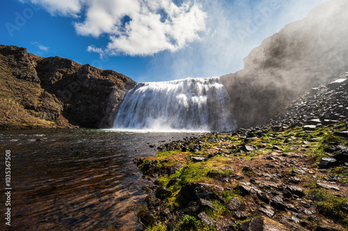 iceland, thorufoss waterfall views during a sunny day photo