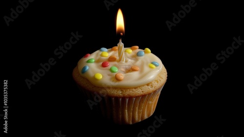 Colorful Cupcake with Candle on Black Background