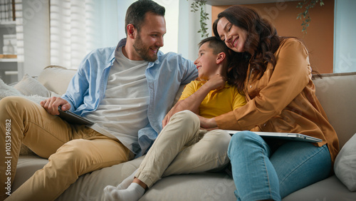 Canvastavla Happy Caucasian family mom dad son parents child kid boy tickling having fun rel