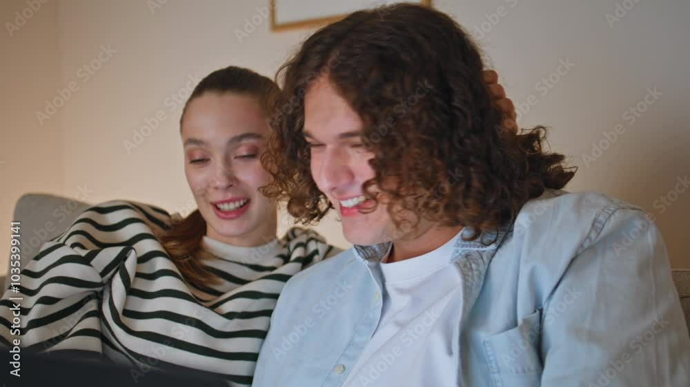 Married pair talking laptop camera enjoy online conversation at couch closeup. Married pair talking laptop camera enjoy online conversation at couch closeup.