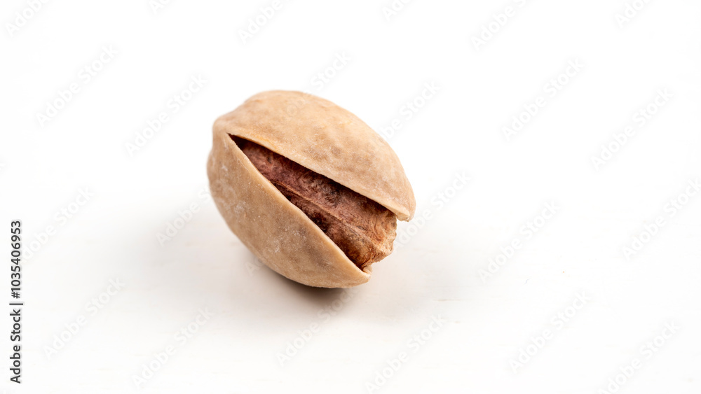 ripe beautiful pistachio on a white background ripe beautiful pistachio on a white background