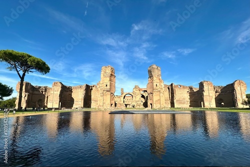 Rome baths of Caracalla seen mirrored into the water surface.