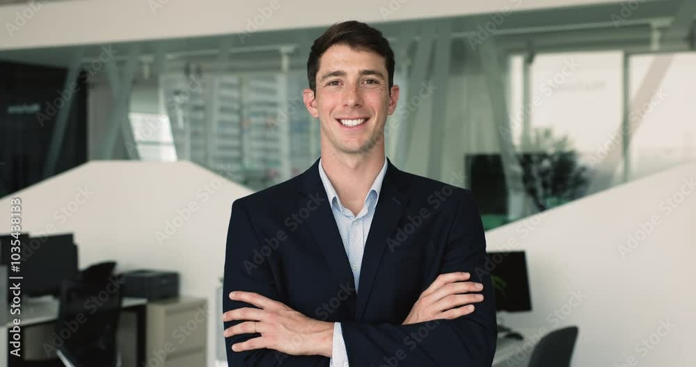 Portrait of confident businessman in suit, financial analyst or auditor posing in modern workplace, smile, looking at camera. Head shot of professional office employee, business person. Career growth Portrait of confident businessman in suit, financial analyst or auditor posing in modern workplace, smile, looking at camera. Head shot of professional office employee, business person. Career growth