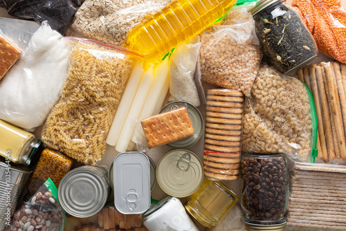 Canned goods, cereals, and pasta stored for quarantine and isolation, ensuring long-term survival and food security at home, survival during military operations, the concept of stay at home