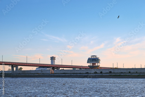 Part of the bridge across the Amur River between Russia and China. Observation tower in the form of a ball on the bank of China. Development of tourism and trade in the Far East.