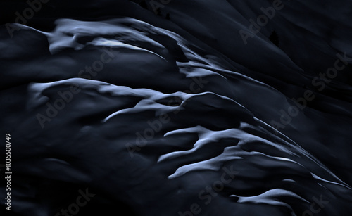 View of abstract snow textures and shadows in a serene landscape, Chamonix, France.