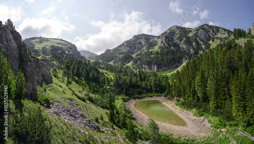 View of Drelaj lake and little Liqenat lake surrounded by the Accursed Mountains range, Rugove, Kosovo. photo